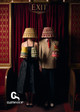 Man and woman in mid-century clothing pose with large lampshades on their heads and small wall lampshades in hand, evoking playful, vintage-inspired lifestyle styling from Clothshop’s Lampshade Collection. Photo by Sophia Spring at the Rivoli Ballroom.